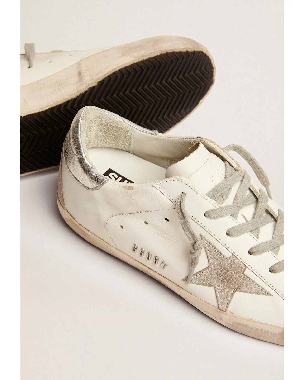 Super-Star sneakers with silver heel tab and metal studs lettering