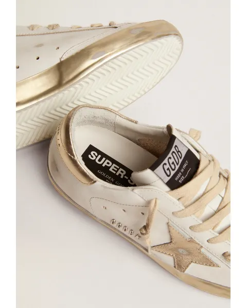Super-Star sneakers with gold sparkle foxing and metal stud