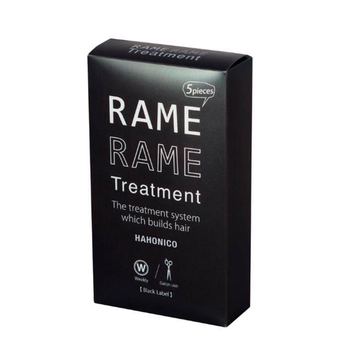 ハホニコの「ラメラメトリートメント」の黒いボックス、ヘアトリートメントシステムとしてラベルが貼られており、5つのピースが含まれ、週に一度の使用に適しています。