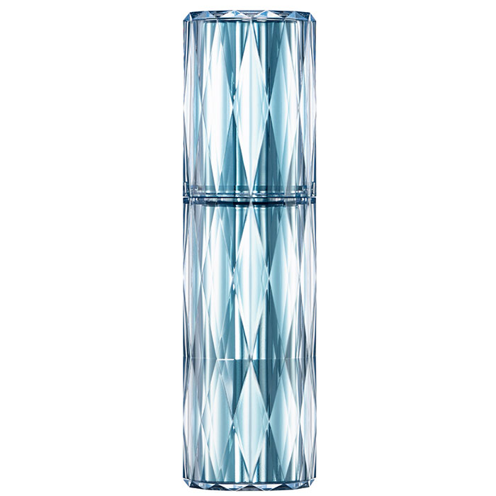 A tall, cylindrical Hikarimirai serum bottle with a faceted, diamond-like blue and clear design, reflecting light and creating a shimmering effect.